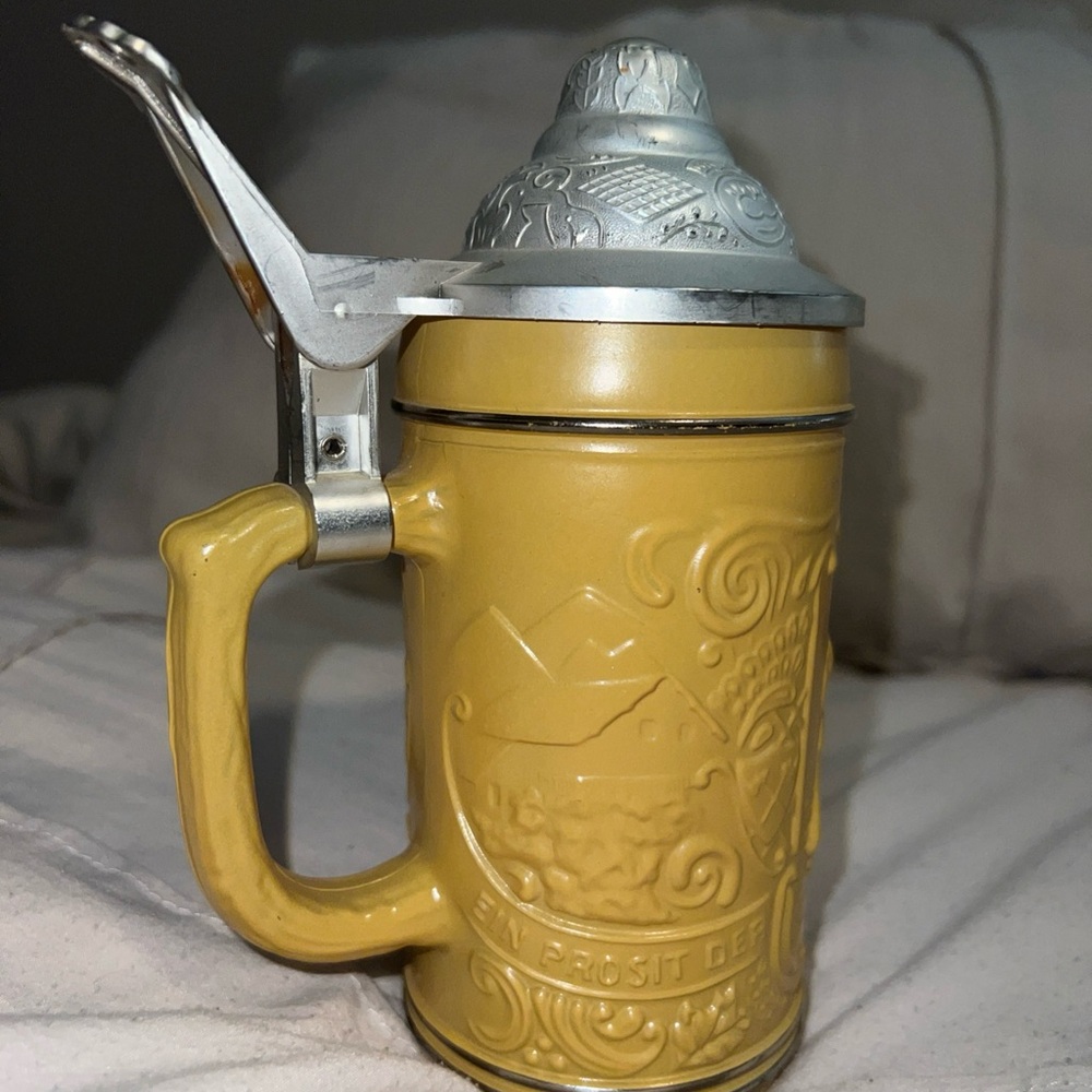 Ornate Yellow Beer Stein with Silver Lid